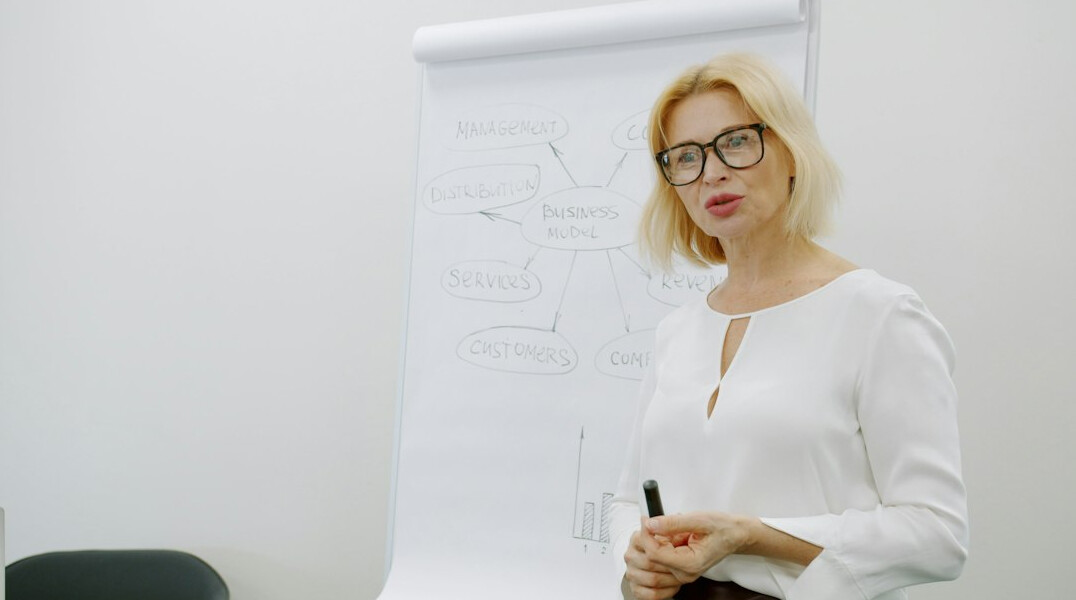 woman speaking confidently at conference